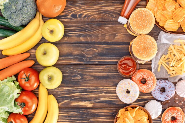 Foods that cause belly fat compared with healthy alternatives including sugary drinks, fast food, fruits, and vegetables.