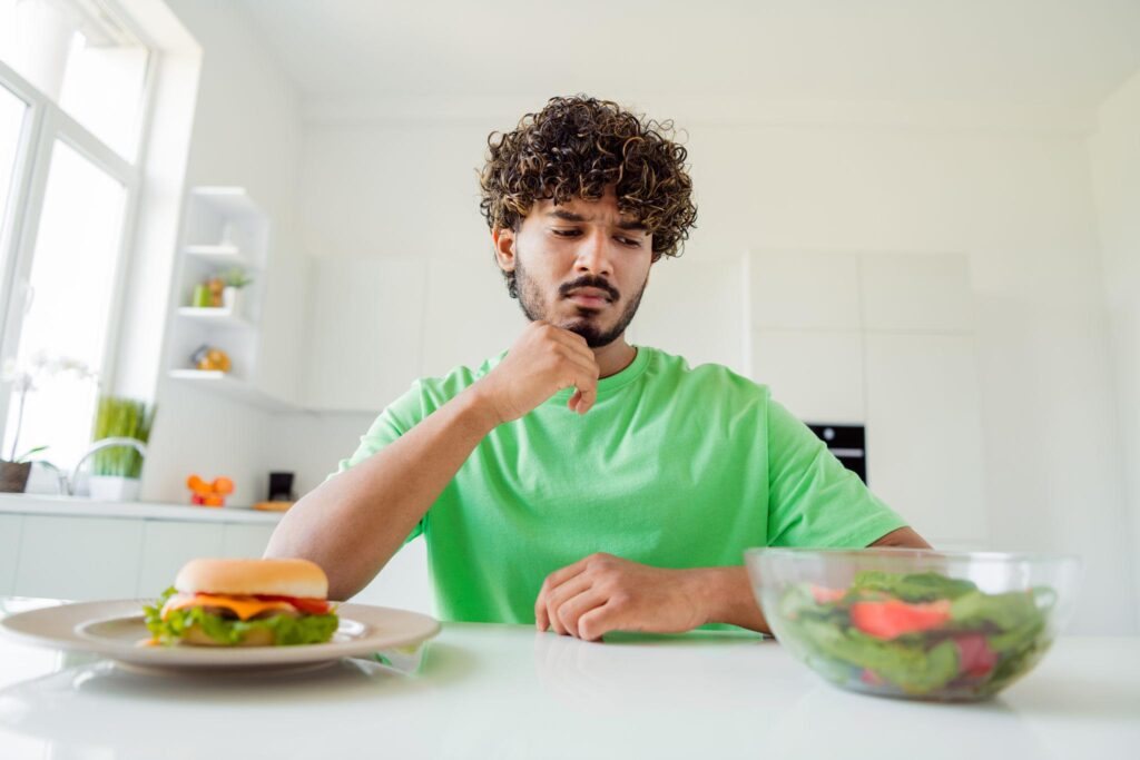 How to Stop Emotional Eating and Lose Weight by choosing healthy meals over junk food and building mindful eating habits.